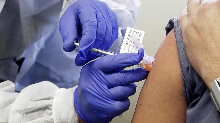 Coronavirus vaccine will not be available for at least 18 months, French minister says