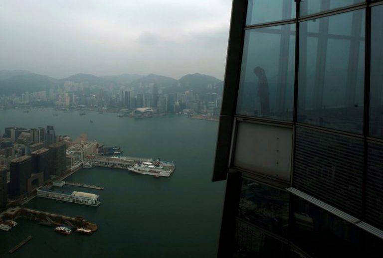Hong Kong cuts full year economic outlook, recovery depends on COVID-19 control