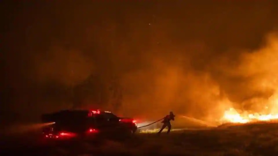 ‘Anything can happen’: Weather helps California firefighters, for now