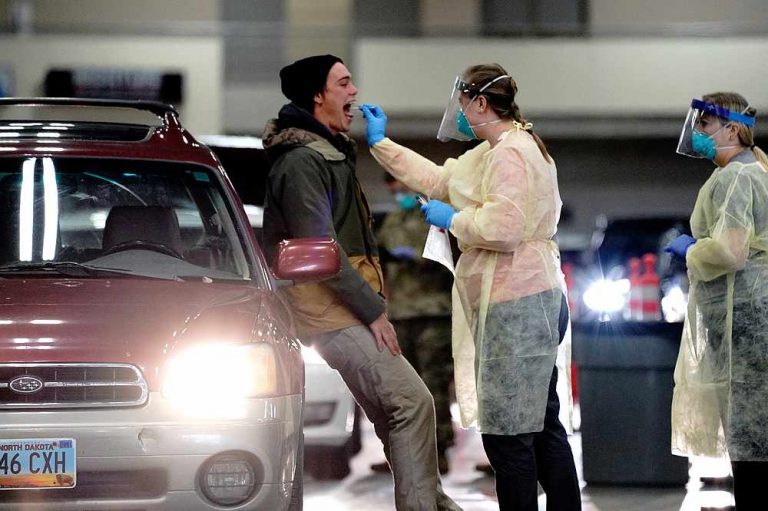 Wave of new Covid-19 cases crashes across US and Europe as winter looms