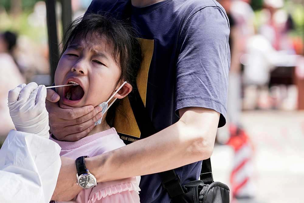 ‘No need to panic,’ China official says of coronavirus variants