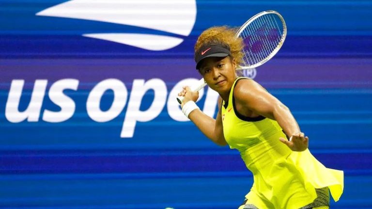 Tennis:Osaka kicks off US Open title defence with straight sets win