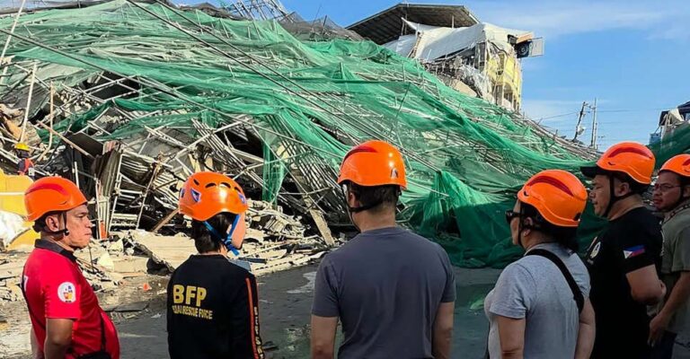 Two trapped people alive after Philippines building collapse, rescue continues