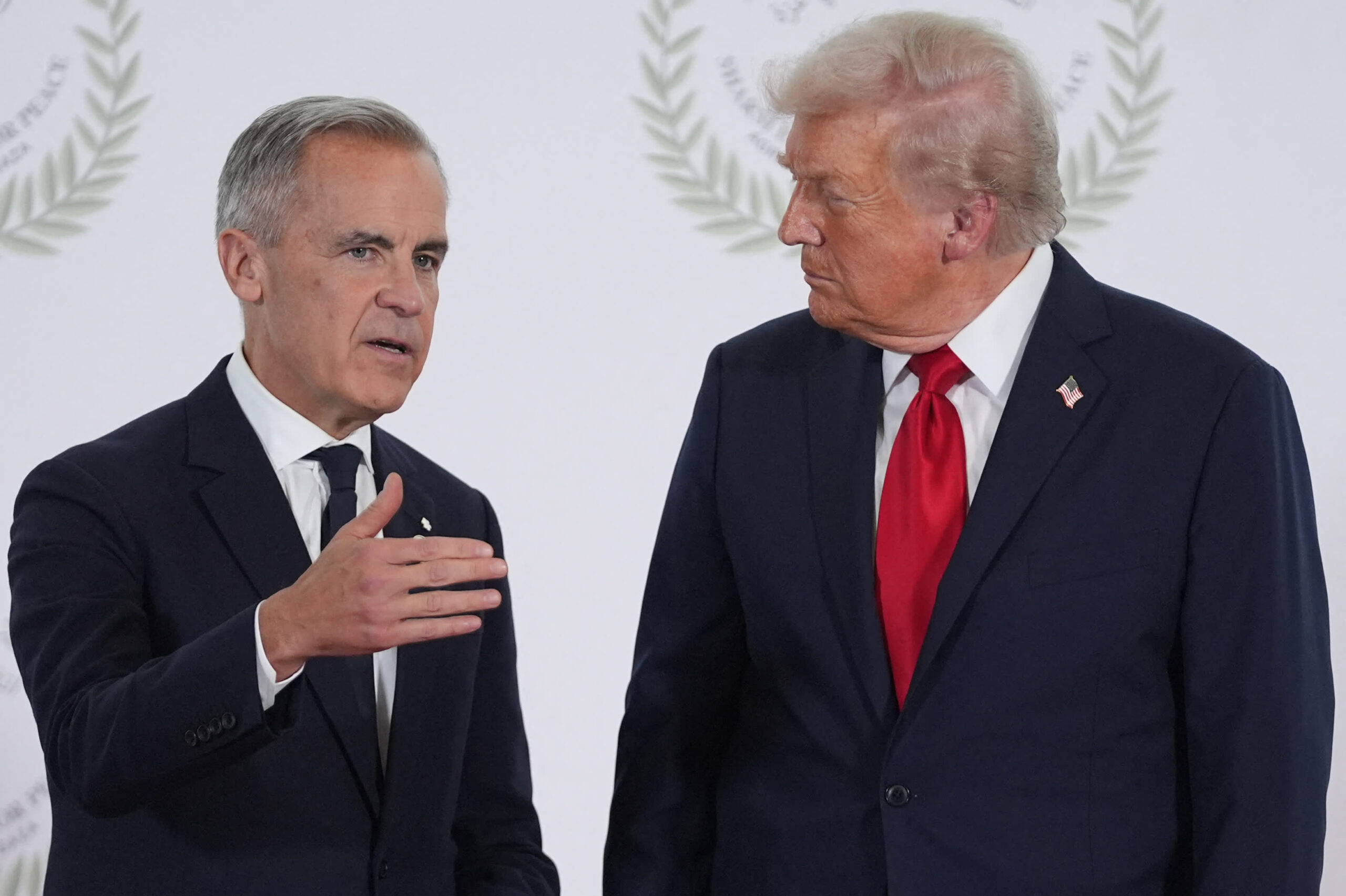 Trump pauses tariffs on Canadian imports, Carney says key work remains